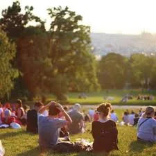 Community members gathering in a park