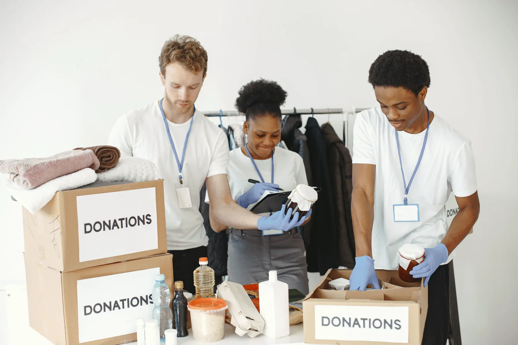 Volunteers organizing donated supplies