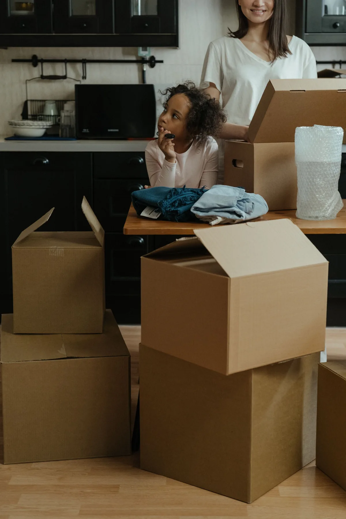 Mother and child preparing for a move